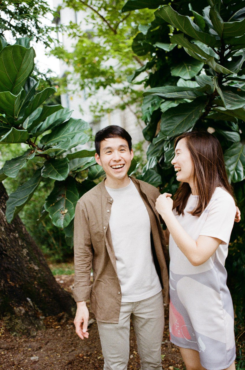 Couple laughing in garden