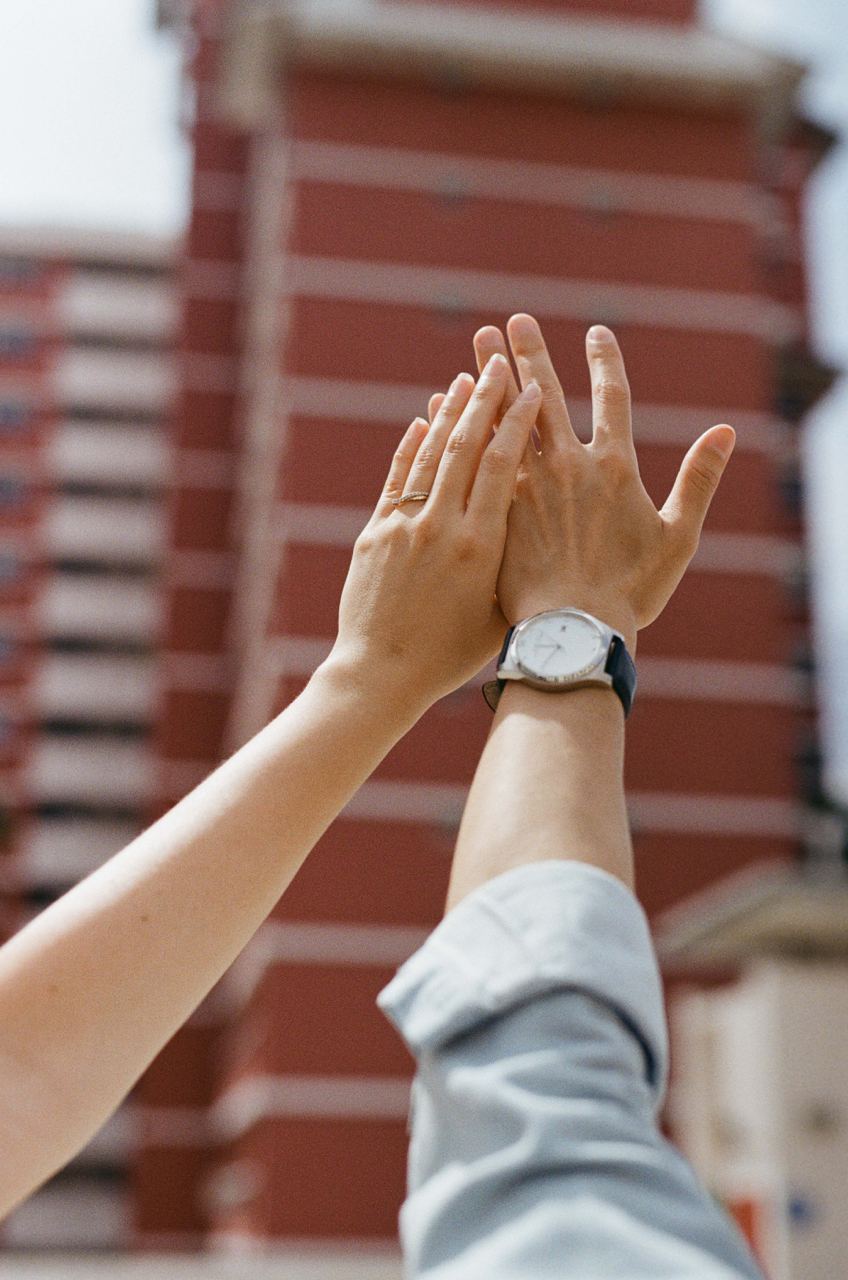 Couple holding hands
